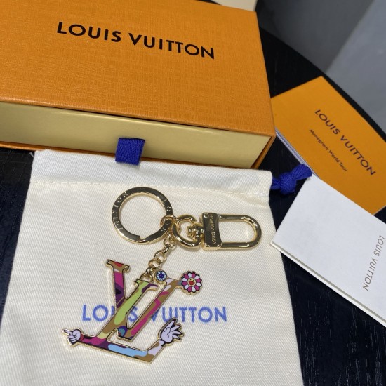50-LV Keychain LV Panda Keychain plucks the heartstrings with fun details.The Sunflower Image Hanging features a Monogram-patterned body, with Monogram floral embellishment of ears, cheeks, nose and feet, paired with Louis Vuitton logos, polished metal ri 50-LV Keychain LV Panda Keychain plucks the heartstrings with fun details.The Sunflower Image Hanging features a Monogram-patterned body, with Monogram floral embellishment of ears, cheeks, nose and feet, paired with Louis Vuitton logos, polished metal ri