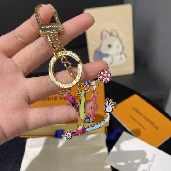 50-LV Keychain LV Panda Keychain plucks the heartstrings with fun details.The Sunflower Image Hanging features a Monogram-patterned body, with Monogram floral embellishment of ears, cheeks, nose and feet, paired with Louis Vuitton logos, polished metal ri 50-LV Keychain LV Panda Keychain plucks the heartstrings with fun details.The Sunflower Image Hanging features a Monogram-patterned body, with Monogram floral embellishment of ears, cheeks, nose and feet, paired with Louis Vuitton logos, polished metal ri