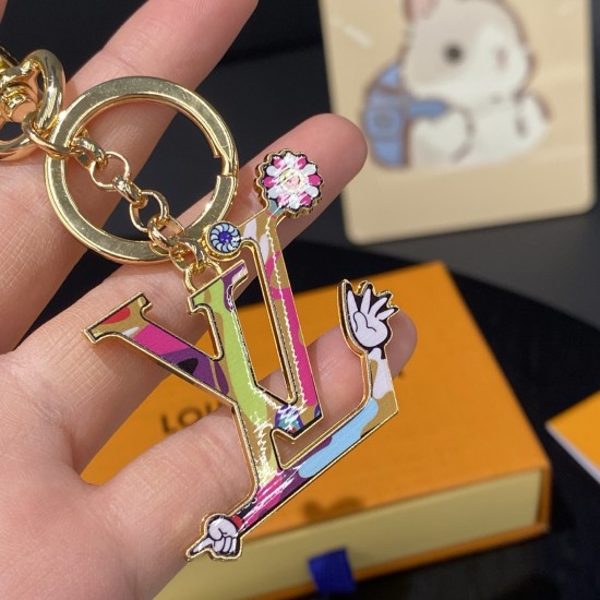 50-LV Keychain LV Panda Keychain plucks the heartstrings with fun details.The Sunflower Image Hanging features a Monogram-patterned body, with Monogram floral embellishment of ears, cheeks, nose and feet, paired with Louis Vuitton logos, polished metal ri 50-LV Keychain LV Panda Keychain plucks the heartstrings with fun details.The Sunflower Image Hanging features a Monogram-patterned body, with Monogram floral embellishment of ears, cheeks, nose and feet, paired with Louis Vuitton logos, polished metal ri