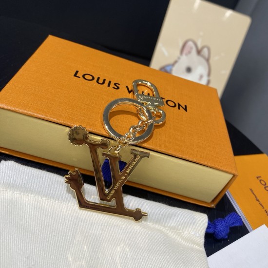 50-LV Keychain LV Panda Keychain plucks the heartstrings with fun details.The Sunflower Image Hanging features a Monogram-patterned body, with Monogram floral embellishment of ears, cheeks, nose and feet, paired with Louis Vuitton logos, polished metal ri 50-LV Keychain LV Panda Keychain plucks the heartstrings with fun details.The Sunflower Image Hanging features a Monogram-patterned body, with Monogram floral embellishment of ears, cheeks, nose and feet, paired with Louis Vuitton logos, polished metal ri